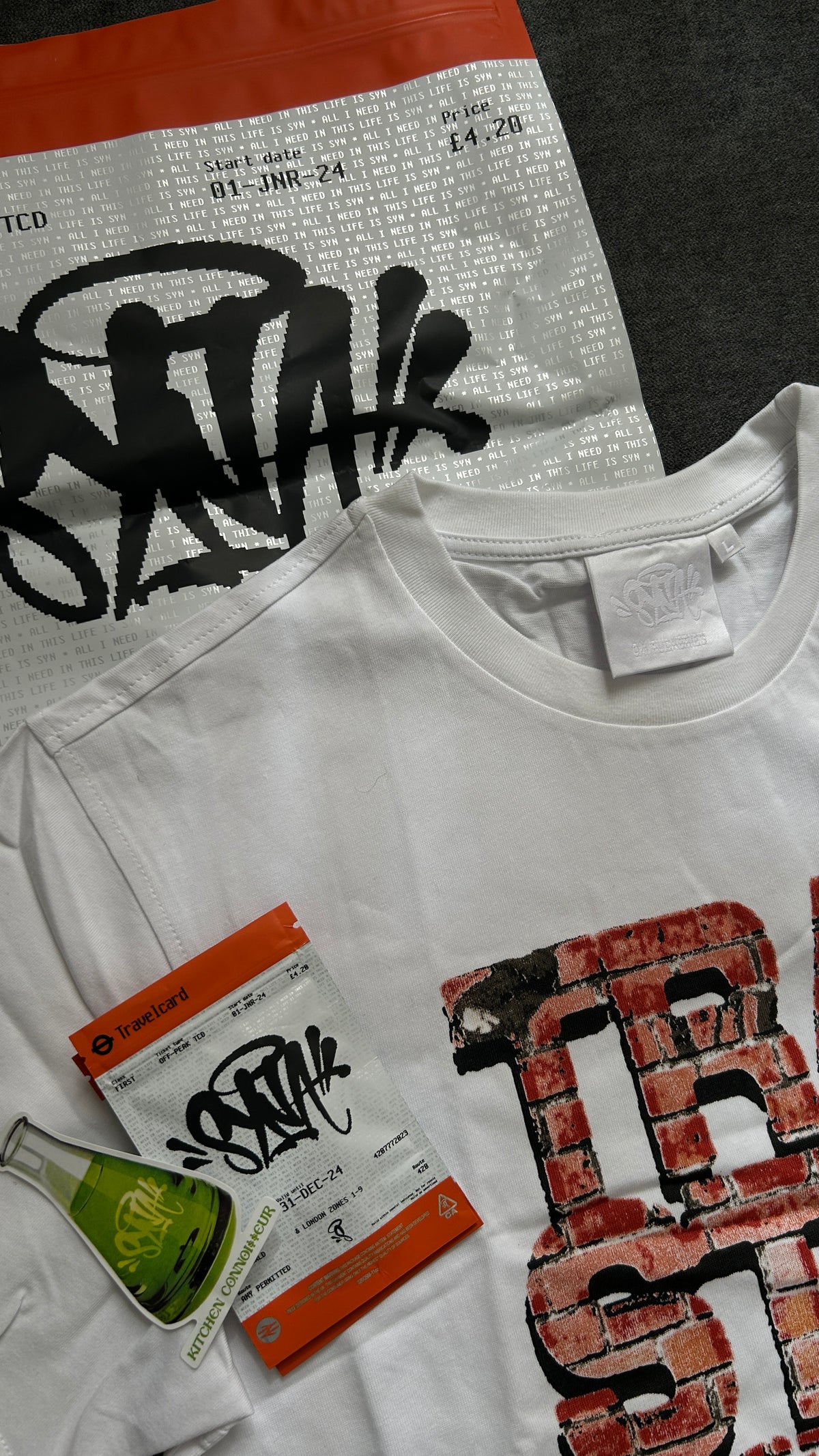 Syna World Trap Still Runnin Tee